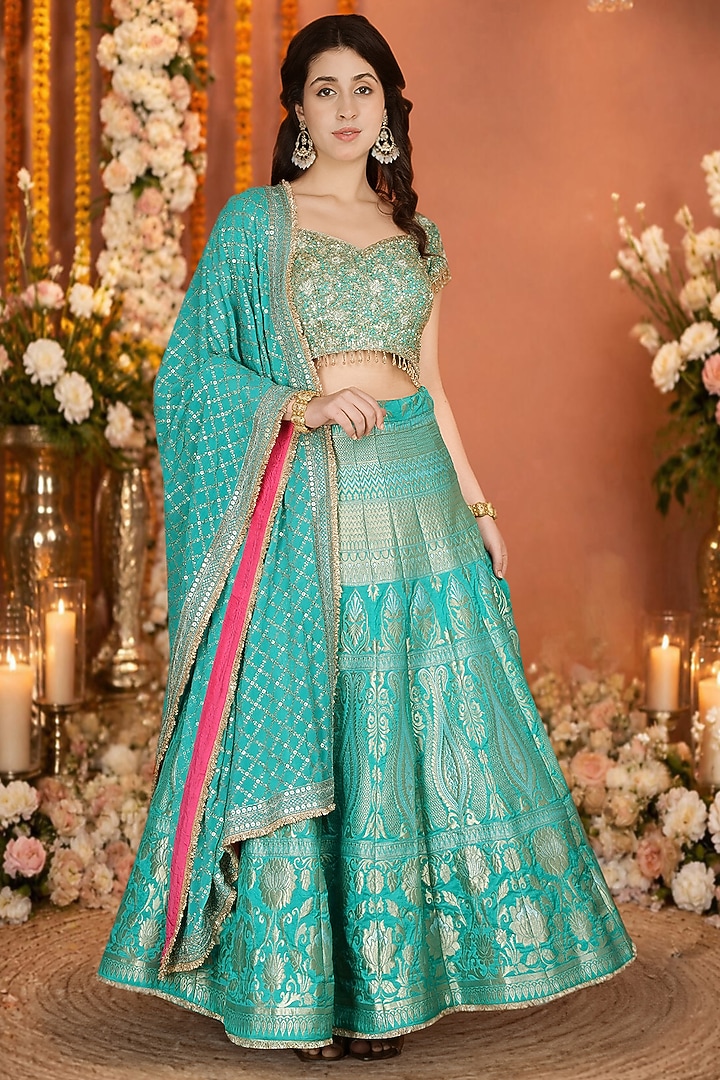 Teal Green Silk Brocade Floral Hand Embroidered Wedding Lehenga Set by Milu Madan at Pernia's Pop Up Shop