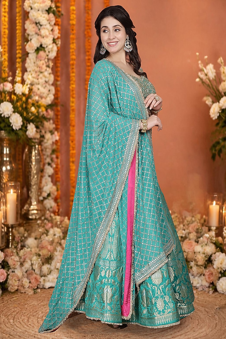 Teal Green Silk Brocade Floral Hand Embroidered Wedding Lehenga Set by Milu Madan at Pernia's Pop Up Shop