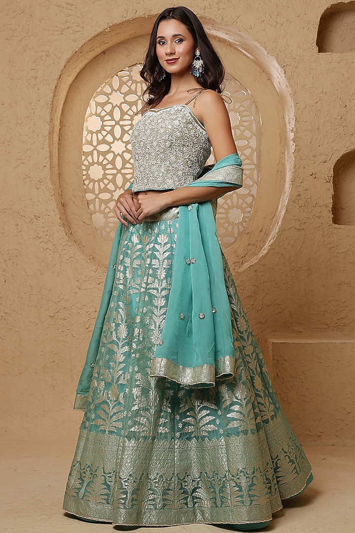 Teal Blue Brocade Pearl Work Wedding Lehenga Set by Milu Madan at Pernia's Pop Up Shop