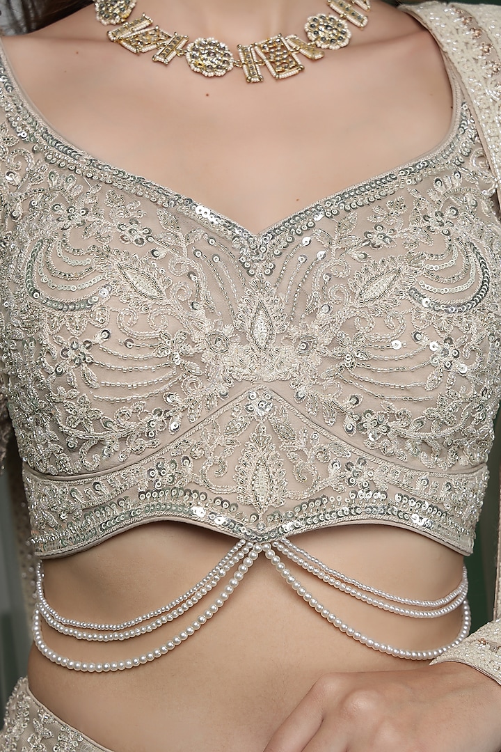Light Fawn Colored Net Hand Embroidered Wedding Lehenga Set by Milu Madan at Pernia's Pop Up Shop