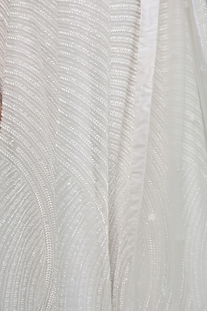 White Net Cutdana Work Wedding Lehenga Set by Milu Madan at Pernia's Pop Up Shop