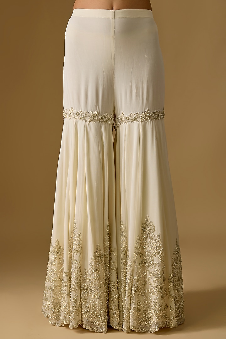 Ivory Georgette Cutdana Work Bridal Sharara Set by Malasa at Pernia's Pop Up Shop