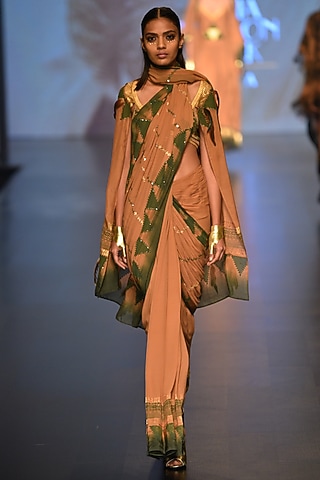 Caramel and olive pyramind Ceremony saree with Cape blouse by Malini Ramani