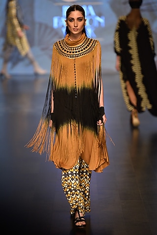 Mustard twiight fringe cape and Healing Jumpsuit by Malini Ramani