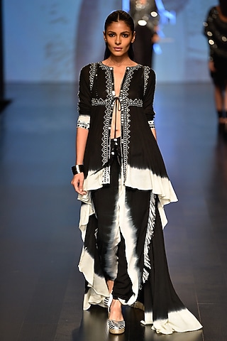 Black and white asymmetric tie-dye tunic and dip deyed pants by Malini Ramani