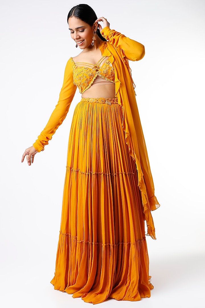 Yellow Embroidered Tiered Wedding Lehenga Set by Mahima Mahajan at Pernia's Pop Up Shop