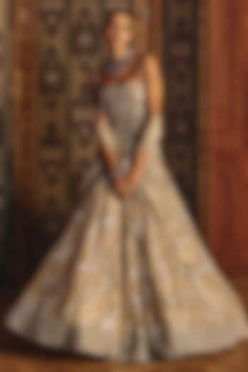 Silver Shimmering Silk Tissue Floral Motif Embroidered Bridal Lehenga Set by Mahima Mahajan at Pernia's Pop Up Shop