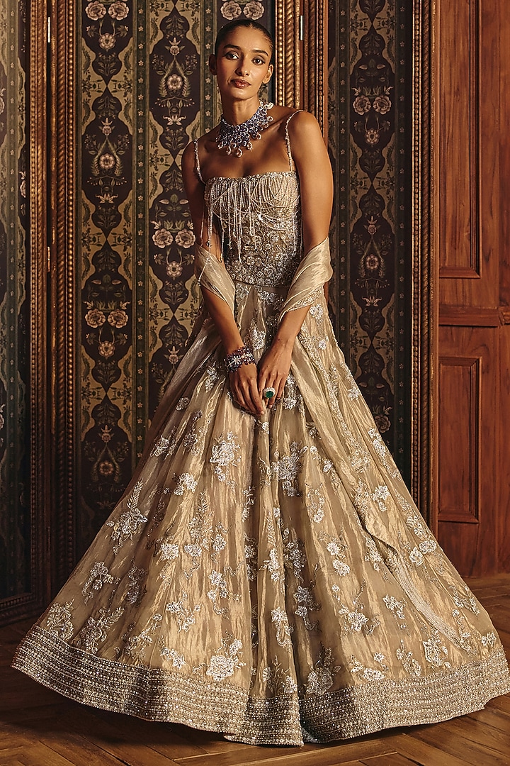 Silver Shimmering Silk Tissue Floral Motif Embroidered Bridal Lehenga Set by Mahima Mahajan at Pernia's Pop Up Shop