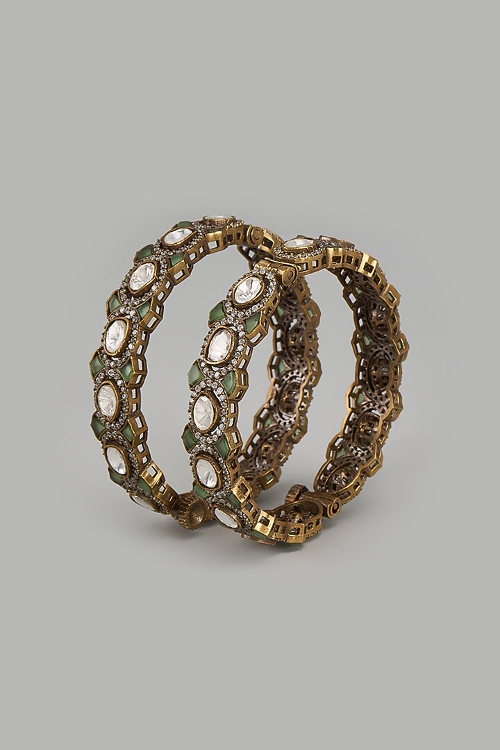 Gold Finish Kundan Polki Bangles (Set of 2) by Moh-Maya by Disha Khatri at Pernia's Pop Up Shop