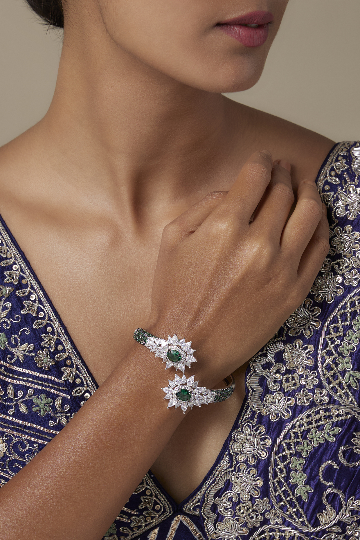 Silver Finish Zircon & Emerald Stone Bracelet by Moh-Maya by Disha Khatri at Pernia's Pop Up Shop