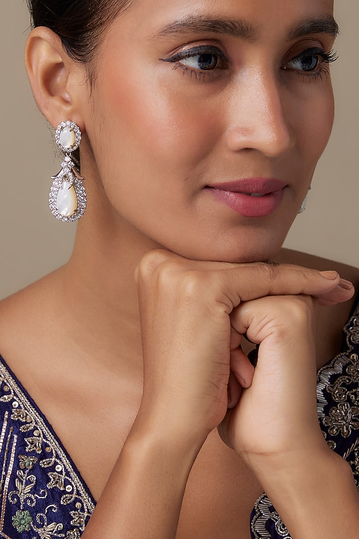 White Finish Zircon & Opal Stone Dangler Earrings by Moh-Maya by Disha Khatri at Pernia's Pop Up Shop