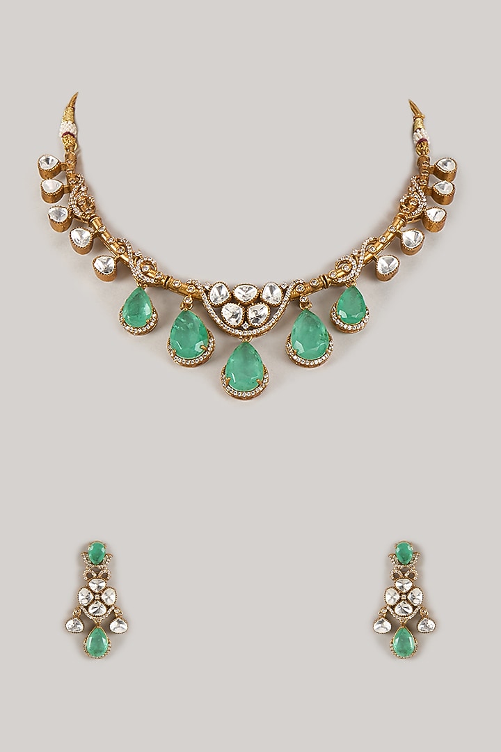 Gold Finish Kundan Polki & Emerald Zircon Choker Necklace Set by Moh-Maya by Disha Khatri at Pernia's Pop Up Shop