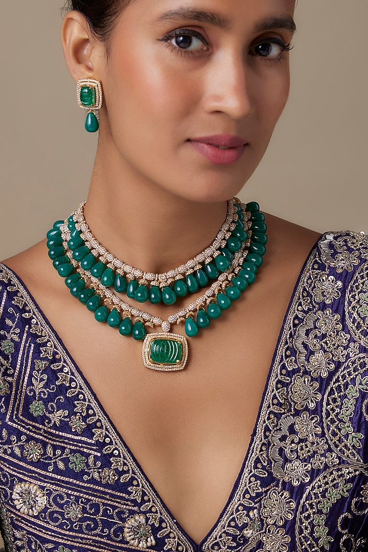 Gold Finish Zircon & Emerald Beaded Layered Necklace Set by Moh-Maya by Disha Khatri at Pernia's Pop Up Shop
