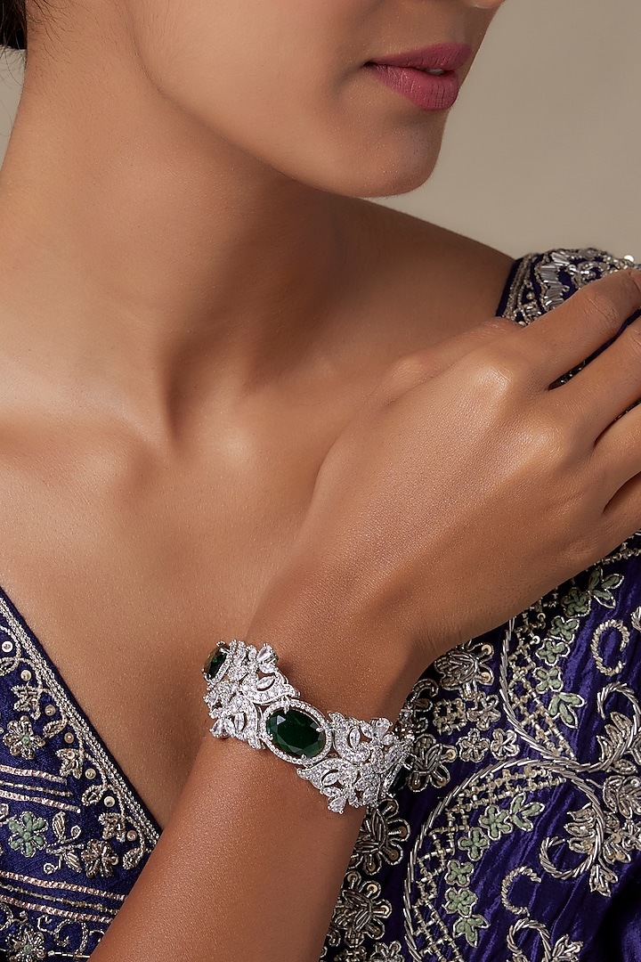 Silver Finish Zircon & Emerald Stone Bracelet by Moh-Maya by Disha Khatri at Pernia's Pop Up Shop