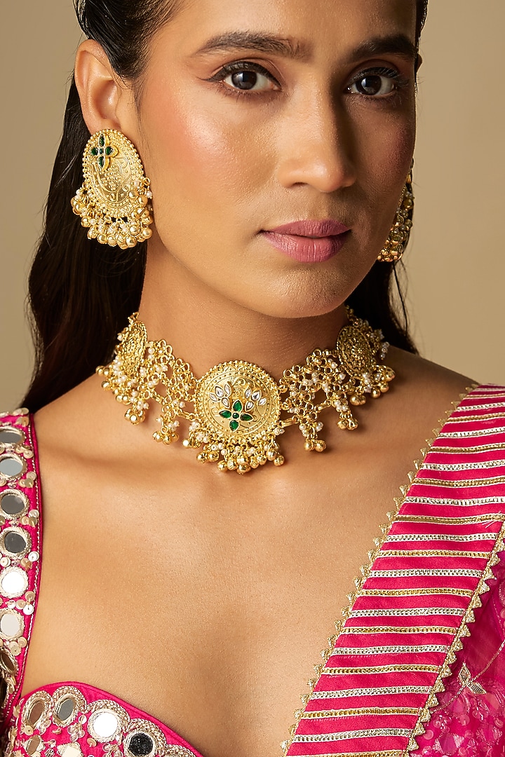 Gold Finish Emerald Stone Bell Choker Necklace Set by Moh-Maya by Disha Khatri at Pernia's Pop Up Shop