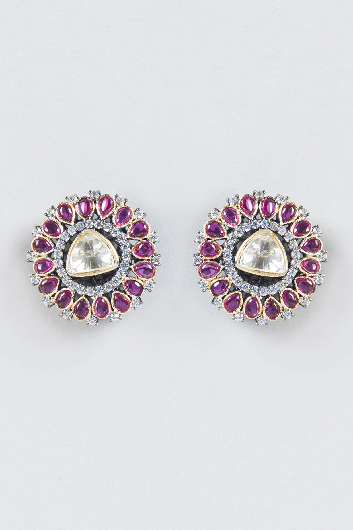 Two Tone Finish Semi Precious Ruby Stud Earrings by Moh-Maya by Disha Khatri at Pernia's Pop Up Shop
