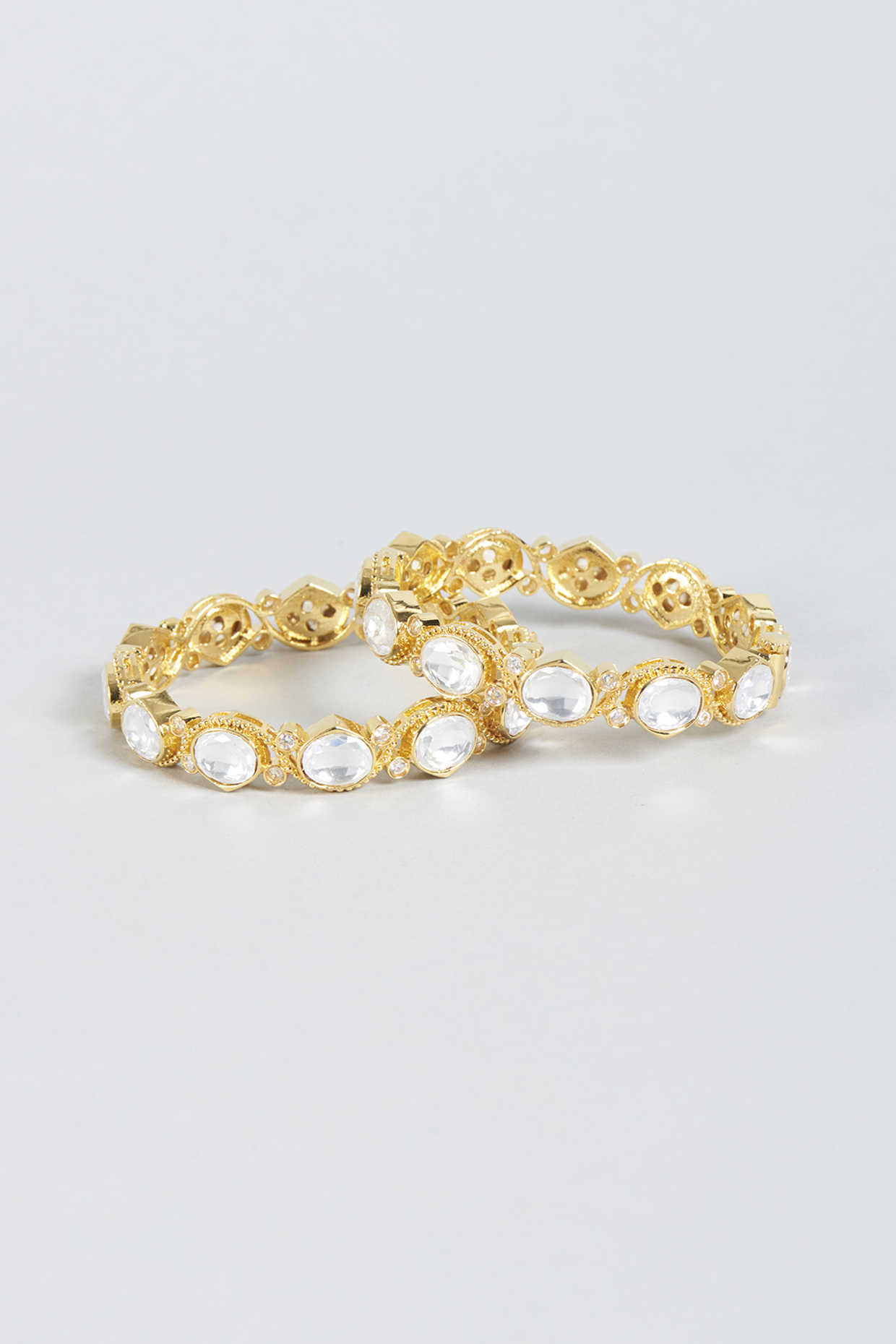 Gold Finish Kundan Polki Openable Kadas (Set of 2) by Moh-Maya by Disha Khatri at Pernia's Pop Up Shop