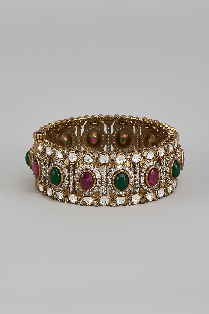 Gold Finish Ruby & Emerald Stone Bangle by Moh-Maya by Disha Khatri at Pernia's Pop Up Shop