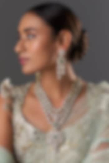 Gold Finish Kundan Polki & Emerald Stone Layered Necklace Set by Moh-Maya by Disha Khatri at Pernia's Pop Up Shop