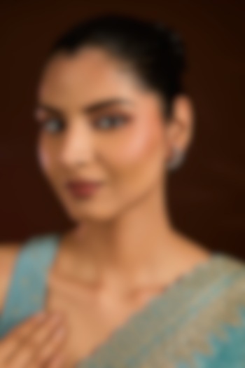 Gold Finish Zircon Stud Earrings by Moh-Maya by Disha Khatri at Pernia's Pop Up Shop