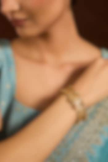 Gold Finish Carved Adjustable Bangle by Moh-Maya by Disha Khatri at Pernia's Pop Up Shop