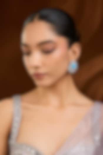 White Finish Blue Stone Stud Earrings by Moh-Maya by Disha Khatri at Pernia's Pop Up Shop