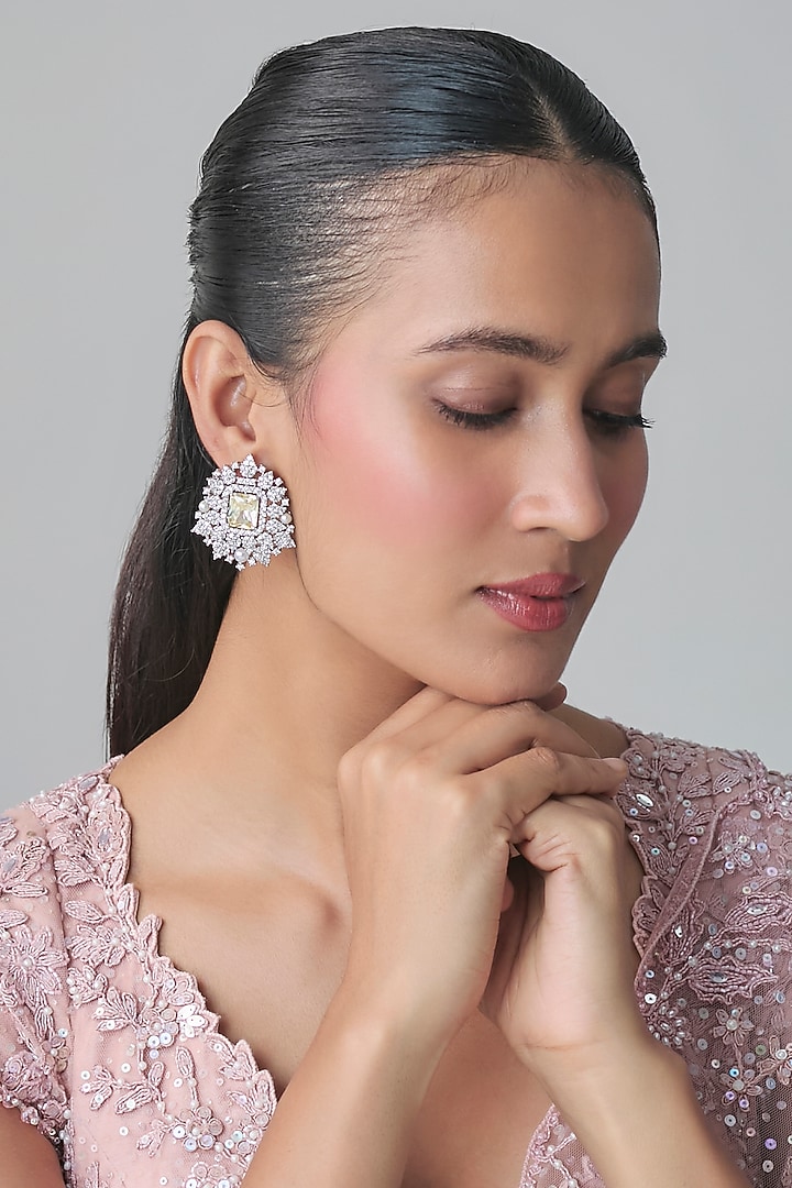 White Gold Finish Zircon Stud Earrings by Moh-Maya by Disha Khatri at Pernia's Pop Up Shop