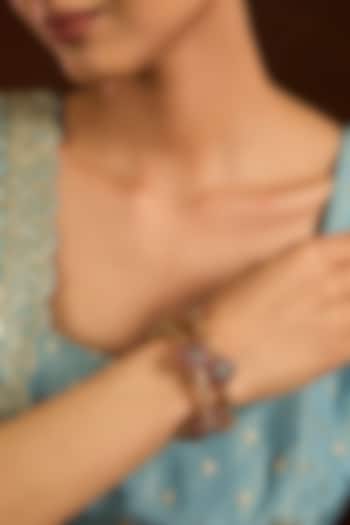 Gold Finish Emerald & Ruby Stone Floral Bangles (Set Of 2) by Moh-Maya by Disha Khatri at Pernia's Pop Up Shop