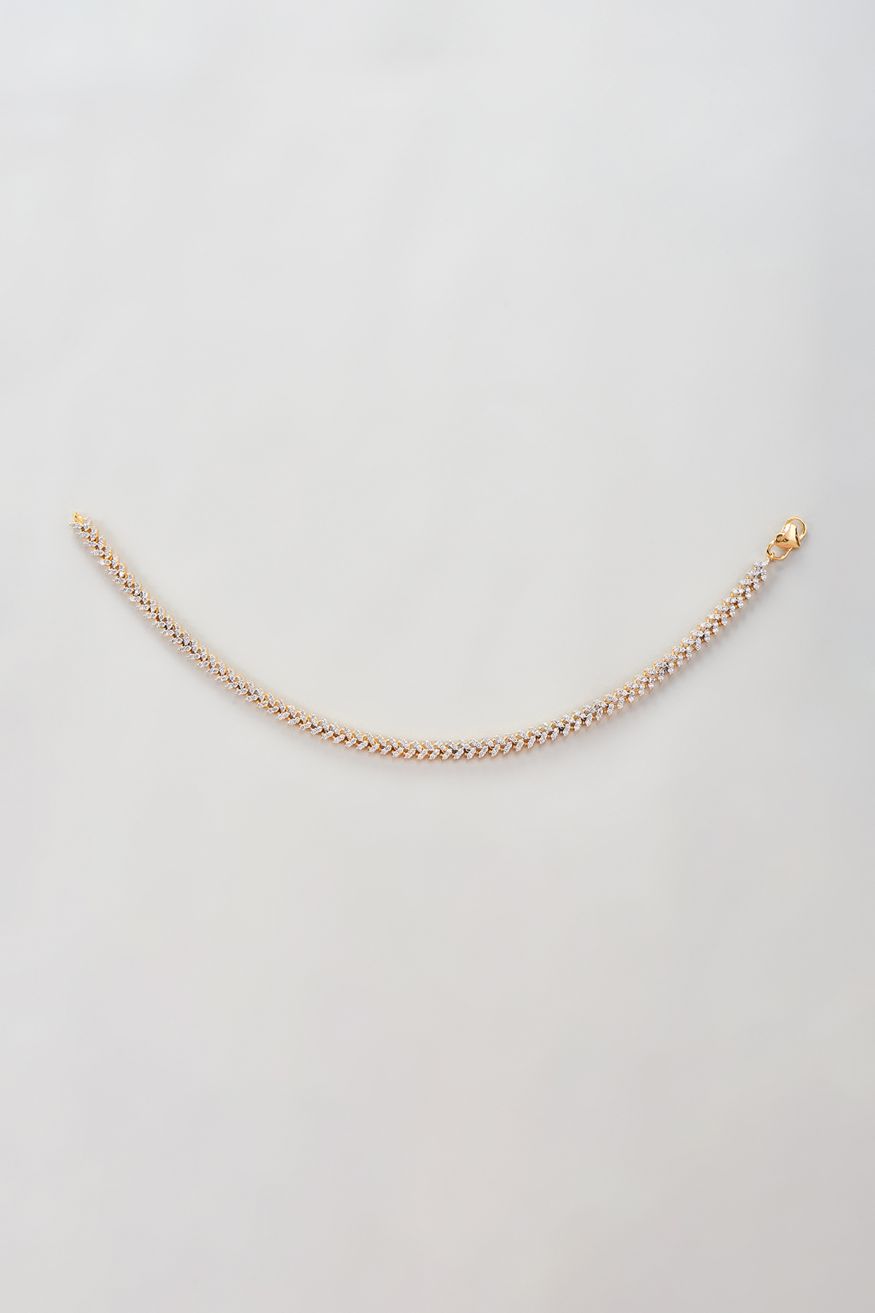 Gold Finish Zircon Anklets (Set Of 2) by Moh-Maya by Disha Khatri at Pernia's Pop Up Shop