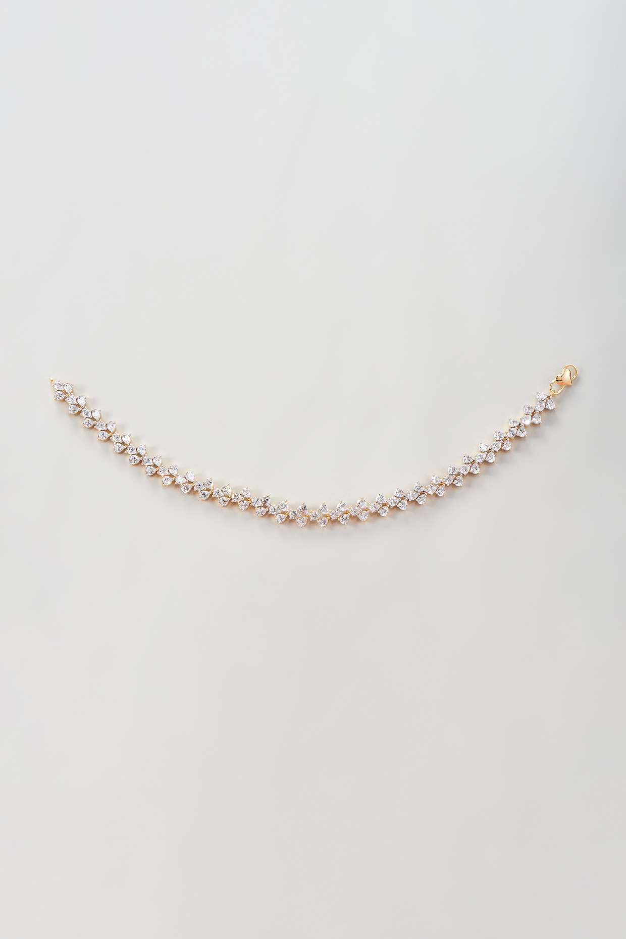 Gold Finish Zircon Anklets (Set Of 2) by Moh-Maya by Disha Khatri at Pernia's Pop Up Shop