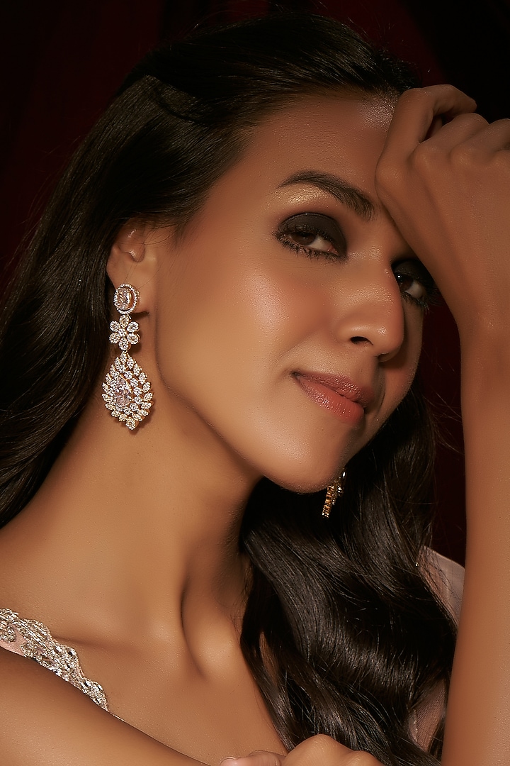 Gold Finish White Zircon Dangler Earrings by Moh-Maya by Disha Khatri at Pernia's Pop Up Shop
