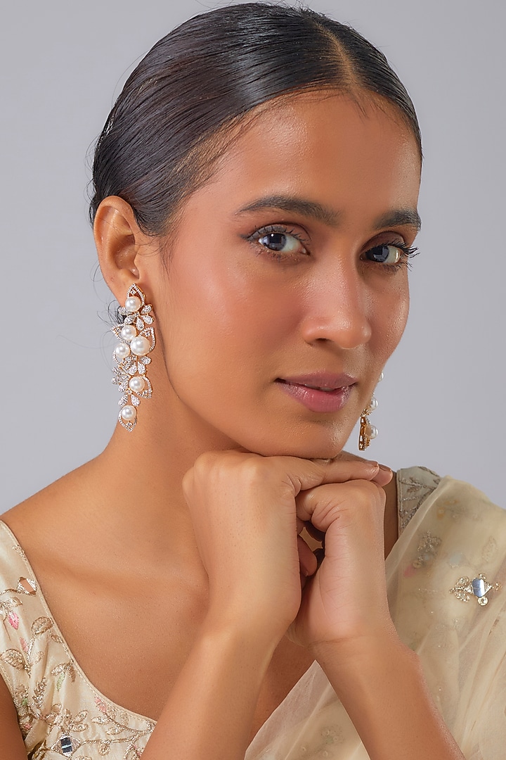 Gold Finish Pearl & Zircon Dangler Earrings by Moh-Maya by Disha Khatri at Pernia's Pop Up Shop