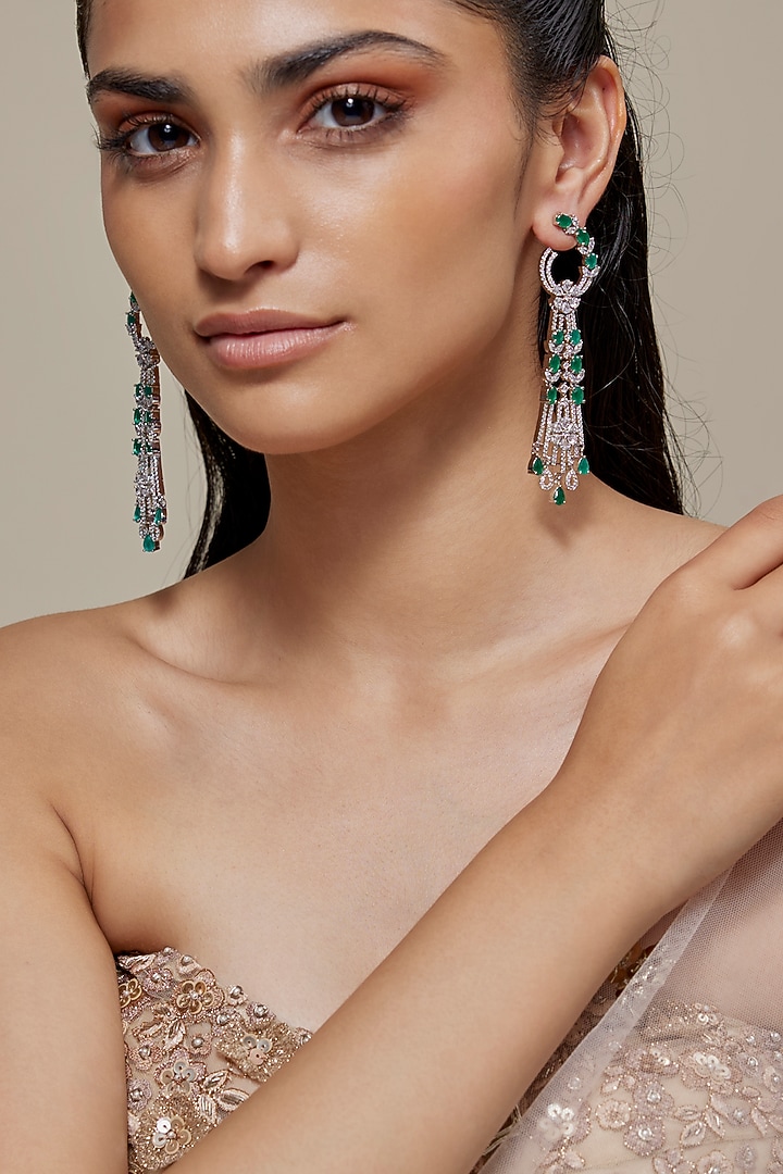 Silver Finish Zircon & Emerald Stone Dangler Earrings by Moh-Maya by Disha Khatri at Pernia's Pop Up Shop