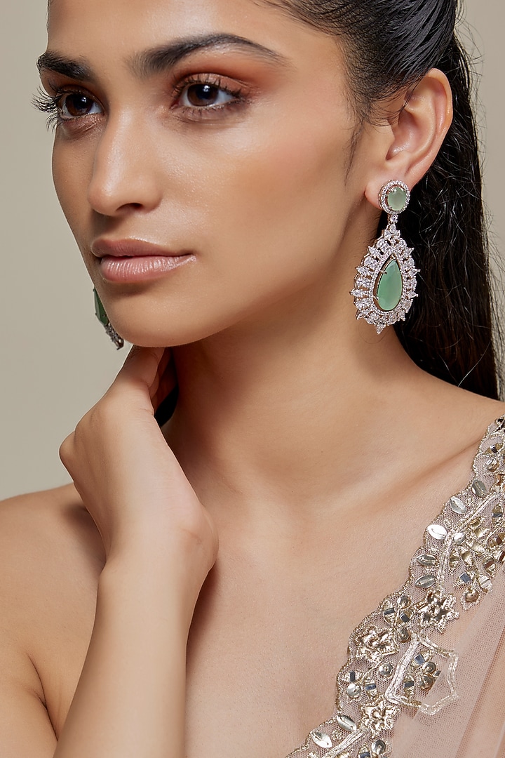 White Finish Zircon & Fluorite Stone Dangler Earrings by Moh-Maya by Disha Khatri at Pernia's Pop Up Shop