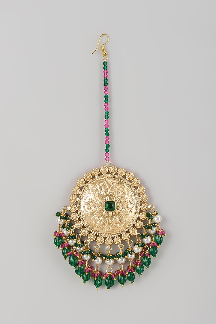 Gold Finish Emerald Stone Maang Tikka by Moh-Maya by Disha Khatri at Pernia's Pop Up Shop
