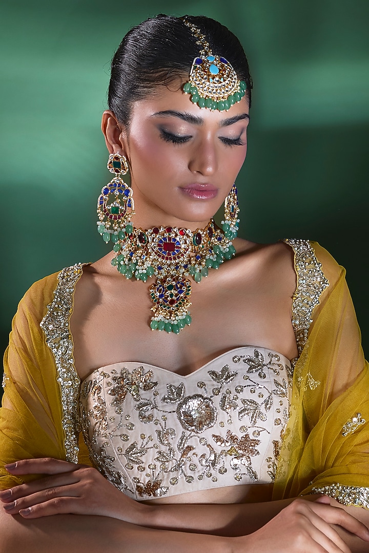 Gold Finish Kundan Polki & Emerald Choker Necklace Set by Moh-Maya by Disha Khatri at Pernia's Pop Up Shop