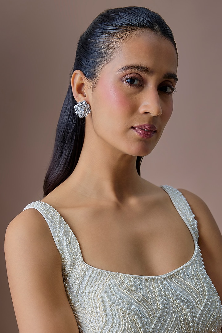 Silver Finish Zircon Stud Earrings by Moh-Maya by Disha Khatri at Pernia's Pop Up Shop