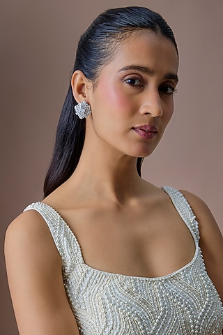 Silver Finish Zircon Stud Earrings by Moh-Maya by Disha Khatri