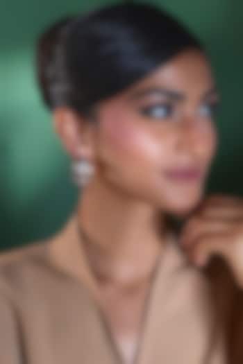 Gold Finish Zircon Stud Earrings by Moh-Maya by Disha Khatri at Pernia's Pop Up Shop