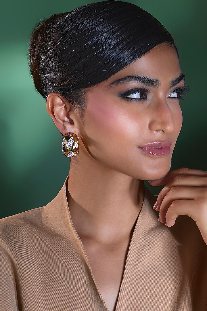 Gold Finish Zircon Stud Earrings by Moh-Maya by Disha Khatri at Pernia's Pop Up Shop
