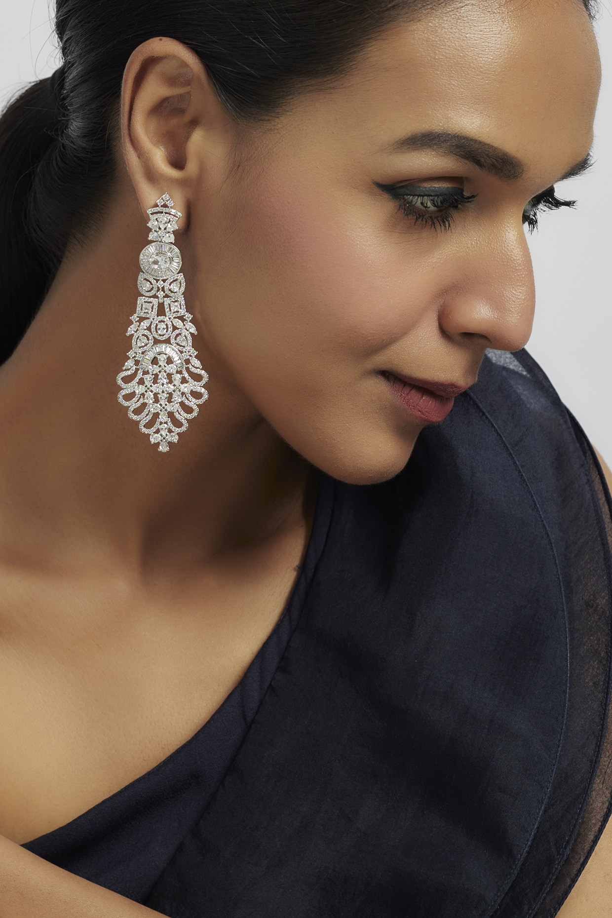White Finish Zircon Dangler Earrings by Moh-Maya by Disha Khatri at Pernia's Pop Up Shop