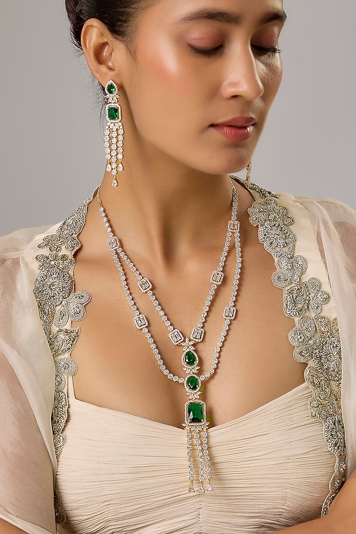 Gold Finish Emerald Stone & Zircon Layered Necklace Set by Moh-Maya by Disha Khatri at Pernia's Pop Up Shop
