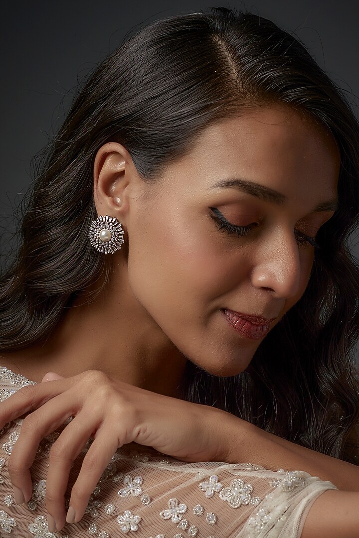 Black Rhodium Finish Pearl & Zircon Stud Earrings by Moh-Maya by Disha Khatri at Pernia's Pop Up Shop