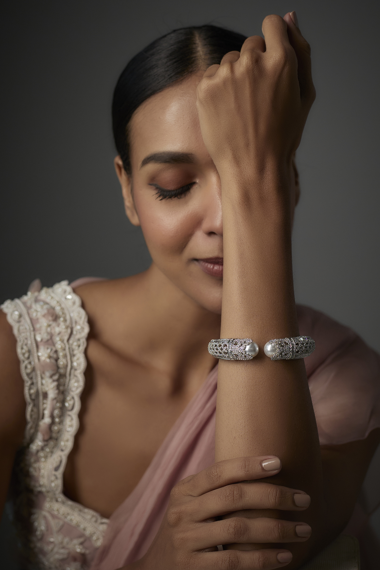 White Finish Pearl & Zircon Openable Bracelet by Moh-Maya by Disha Khatri at Pernia's Pop Up Shop