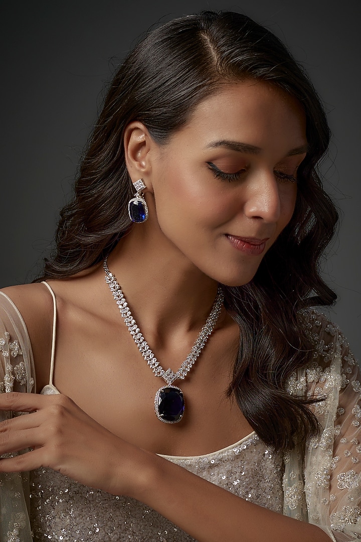 White Finish Blue Stone & Zircon Long Necklace Set by Moh-Maya by Disha Khatri at Pernia's Pop Up Shop