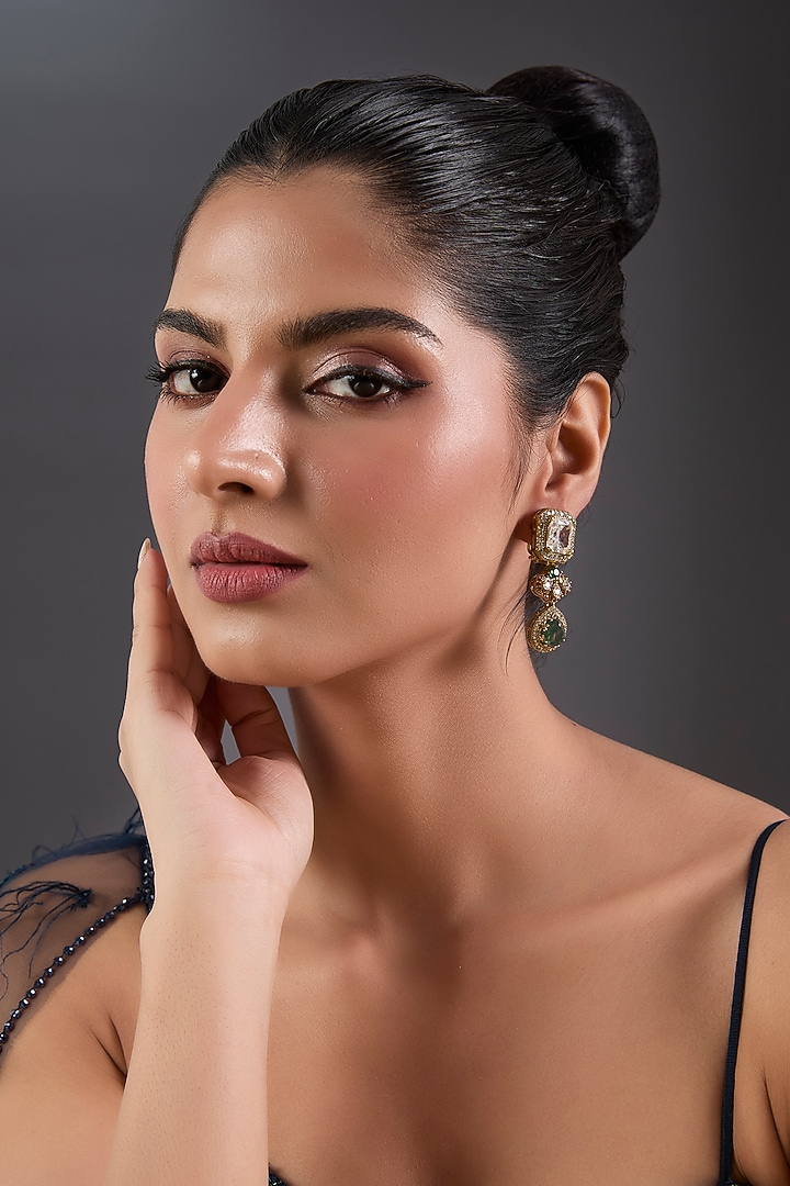 Gold Finish Zircon & Emerald Stone Dangler Earrings by Moh-Maya by Disha Khatri at Pernia's Pop Up Shop