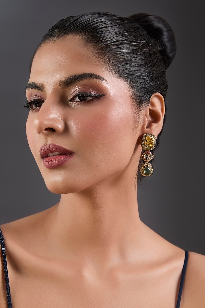 Gold Finish Zircon & Emerald Stone Dangler Earrings by Moh-Maya by Disha Khatri at Pernia's Pop Up Shop