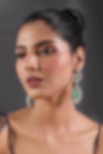 White Finish Zircon & Emerald Stone Dangler Earrings by Moh-Maya by Disha Khatri at Pernia's Pop Up Shop