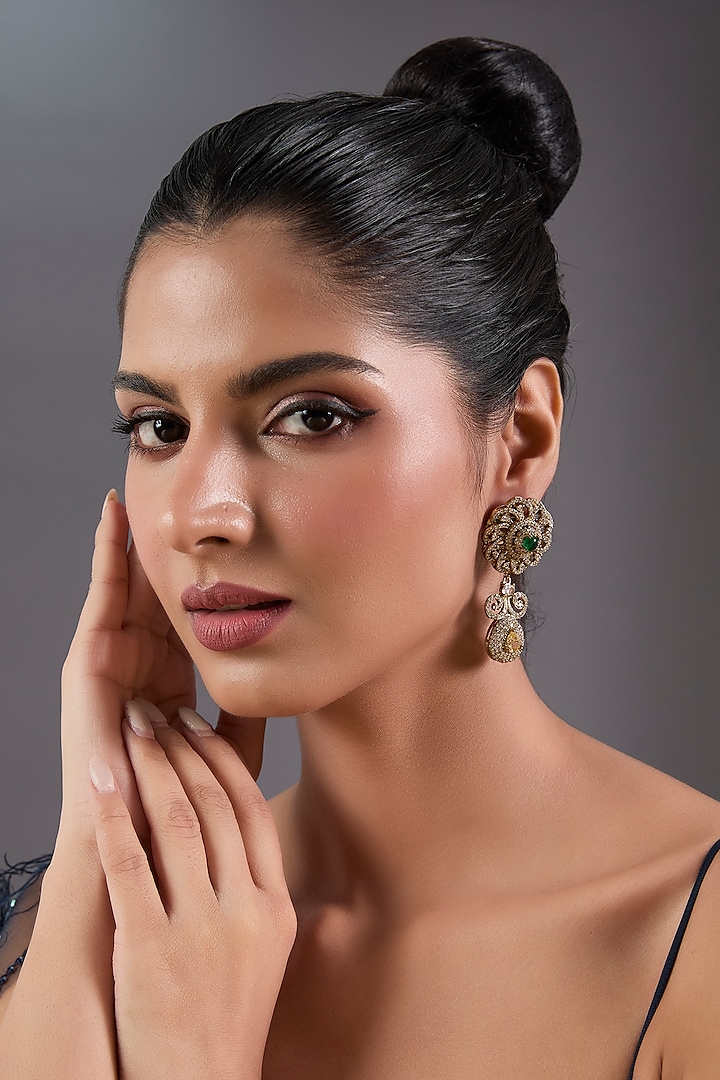 Gold Finish Zircon & Emerald Stone Dangler Earrings by Moh-Maya by Disha Khatri at Pernia's Pop Up Shop