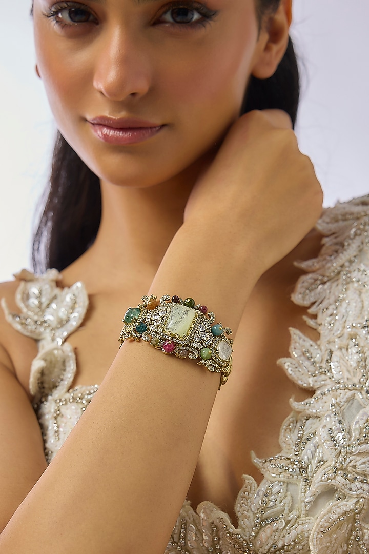 Gold Finish Kundan Polki & Multi-Colored Stone Bracelet by Moh-Maya by Disha Khatri at Pernia's Pop Up Shop